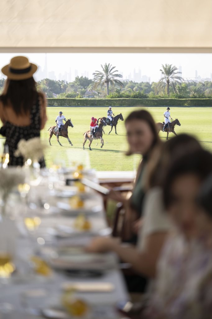 Long-table lunch overlooking a polo match