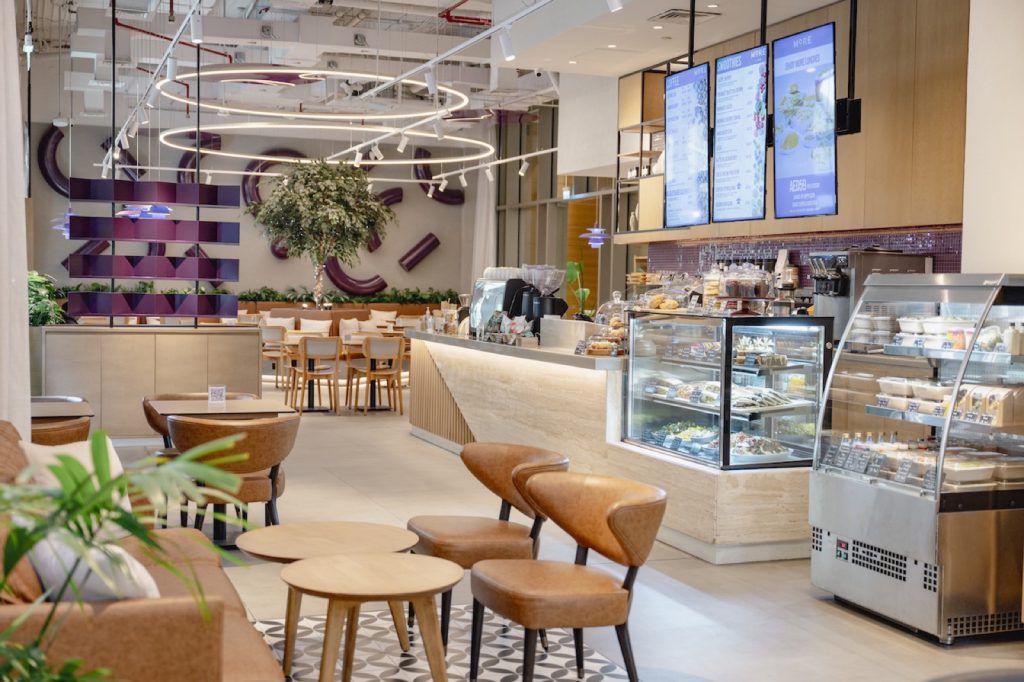 Bright cafe interior with counter and seating